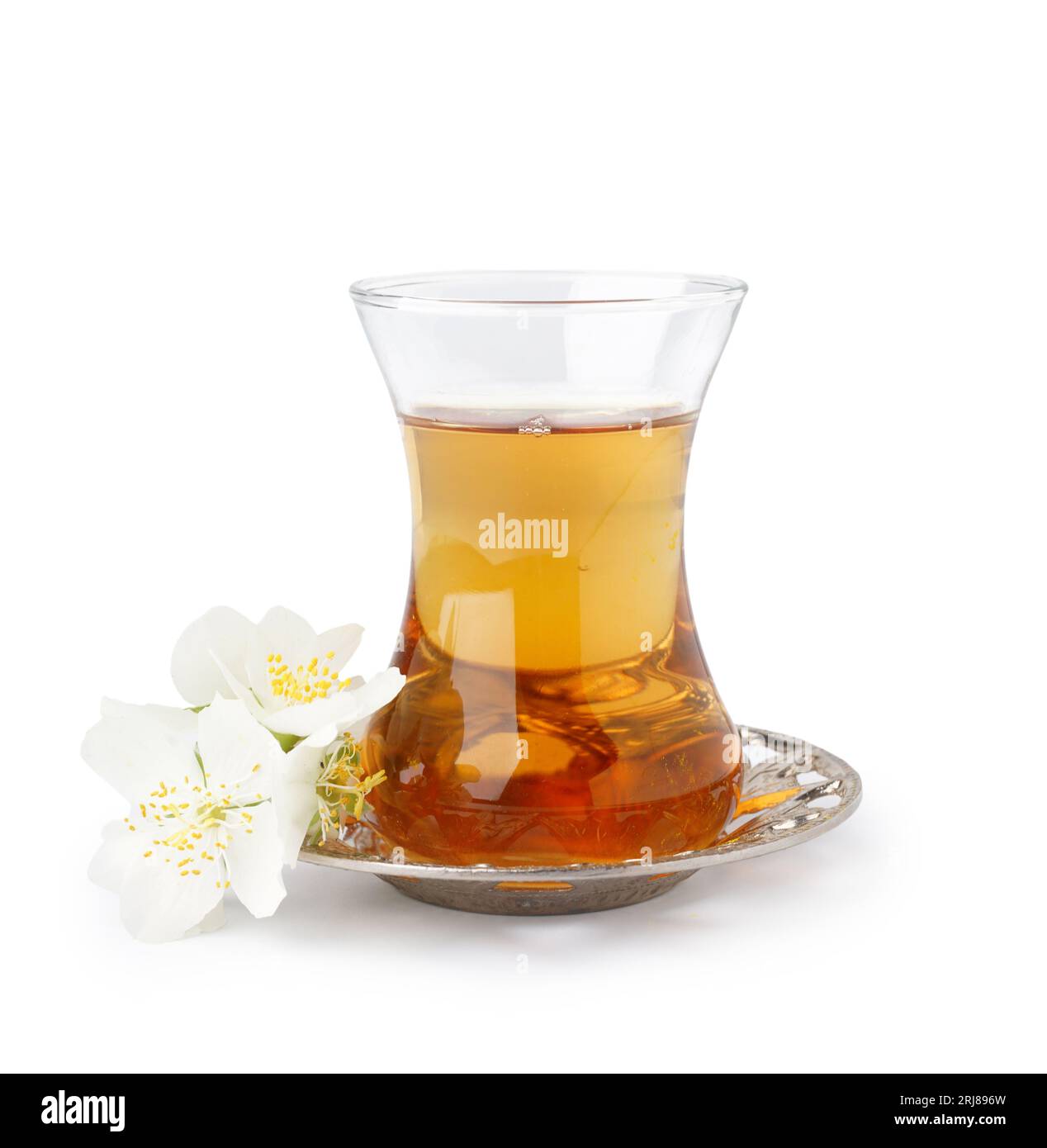 Cup of tea and jasmine flowers on white background Stock Photo Alamy