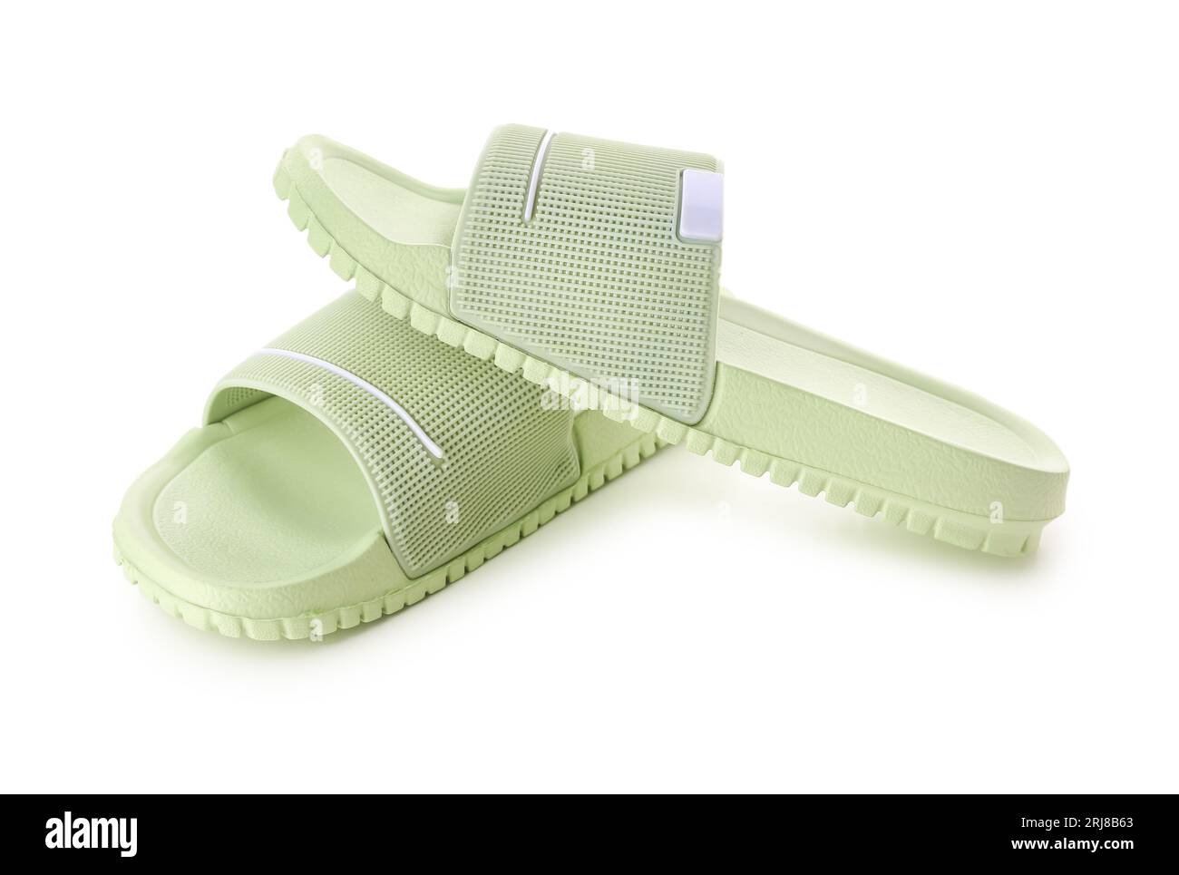 Green female flip flops on white background Stock Photo - Alamy