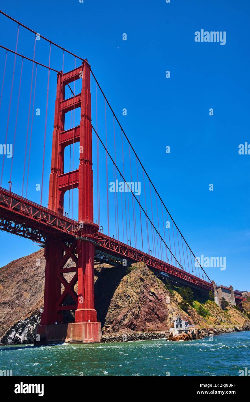Golden Gate Bridge close up side view on bright sunny day with clear
