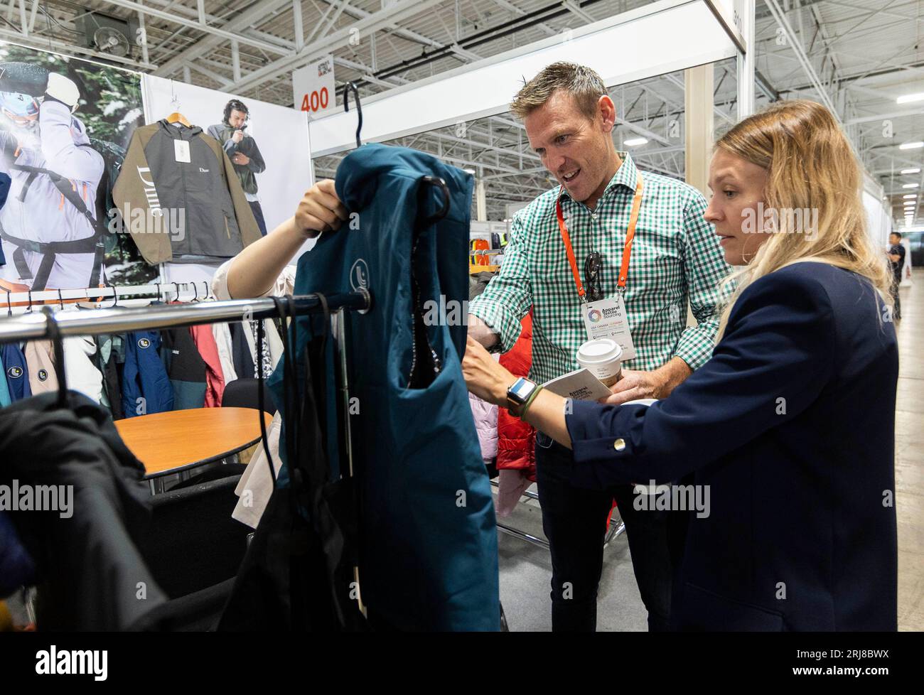 Toronto, Canada. 21st Aug, 2023. Attendees visit a booth at the 2023