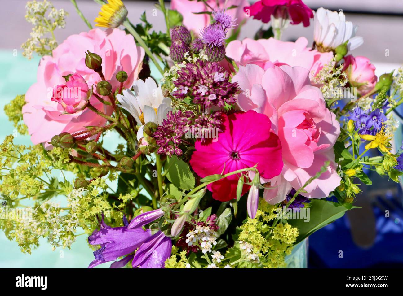 Romantic bouquet of Swedish garden flowers and wild flowers. Stock Photo