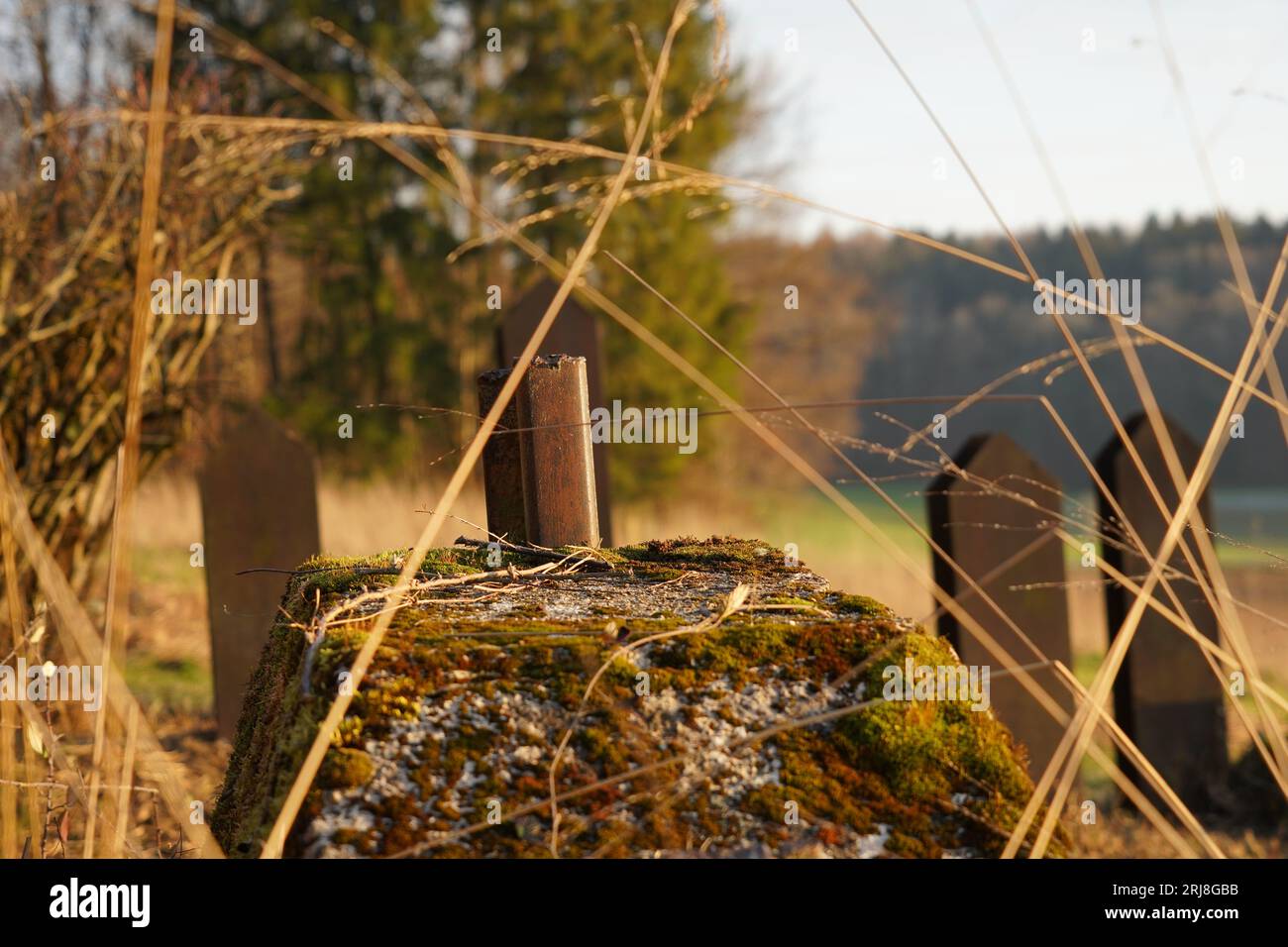 Anti tank toblerone obstacles and reinforced with metal rail was made to stop army enemy troops. Stock Photo