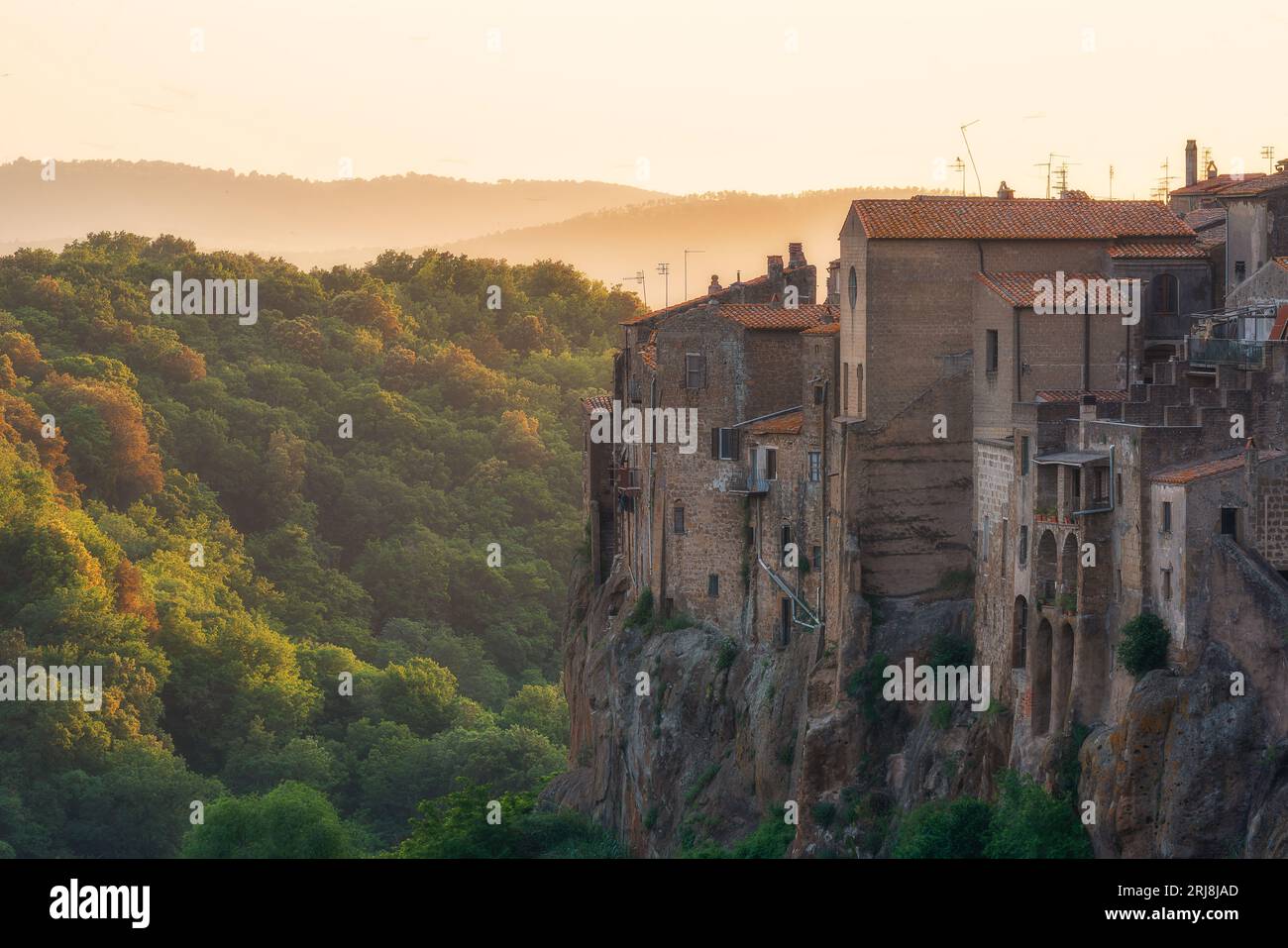 Italian medieval ancient city, historical town buildings on the cliff ...