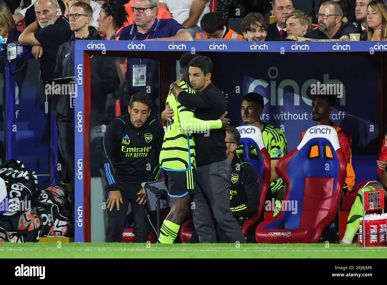 Mikel Arteta manager of Arsenal embraces Eddie Nketiah #14 of Arsenal as he substituted during the Premier League match Crystal Palace vs Arsenal at Selhurst Park, London, United Kingdom, 21st August 2023  (Photo by Mark Cosgrove/News Images) Stock Photo