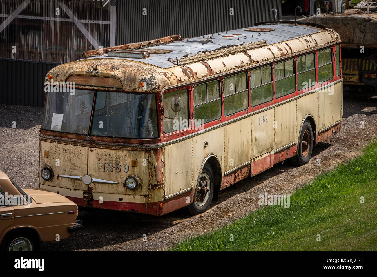 Abandoned rust covered trolleybus or bus Stock Photo