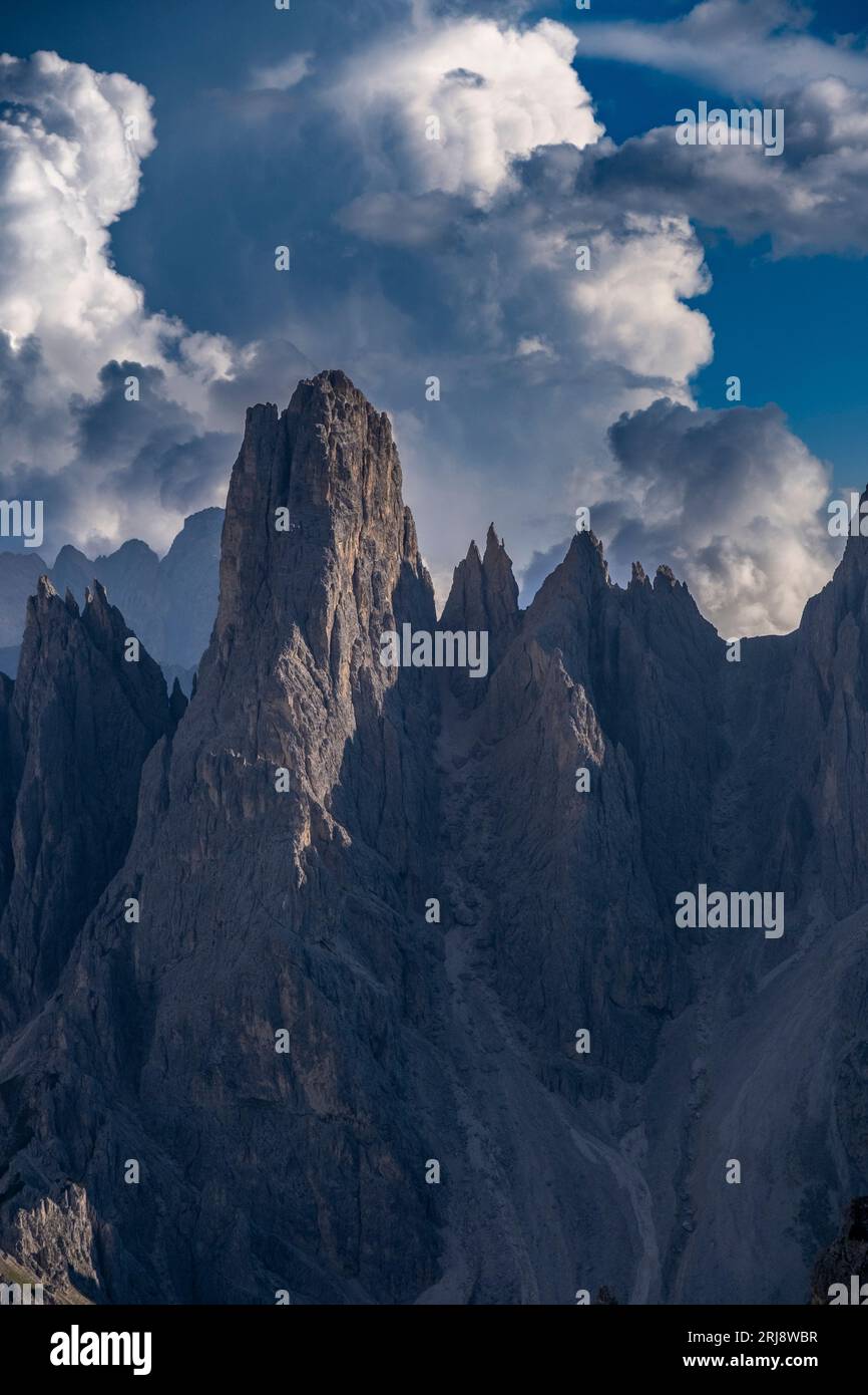 Mountain Peaks of Tre Cime under the blue sky Stock Photo