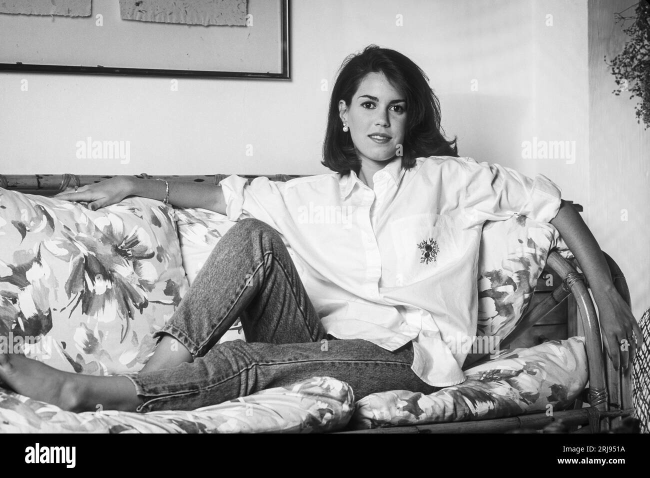 Beautiful woman home on sofa Black and White Stock Photos & Images - Alamy