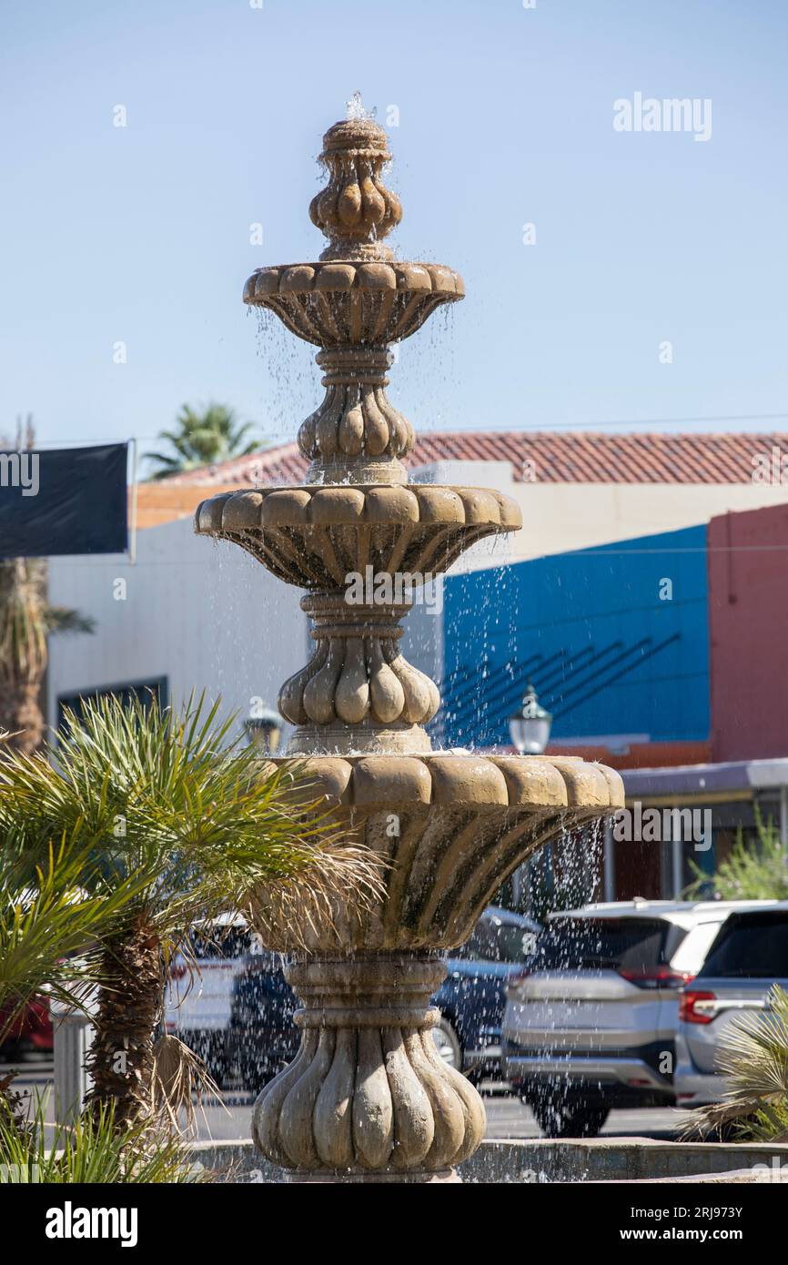 Yuma, Arizona, USA - May 27, 2022: Afternoon sun shines on the historic fountain of Downtown Yuma. Stock Photo