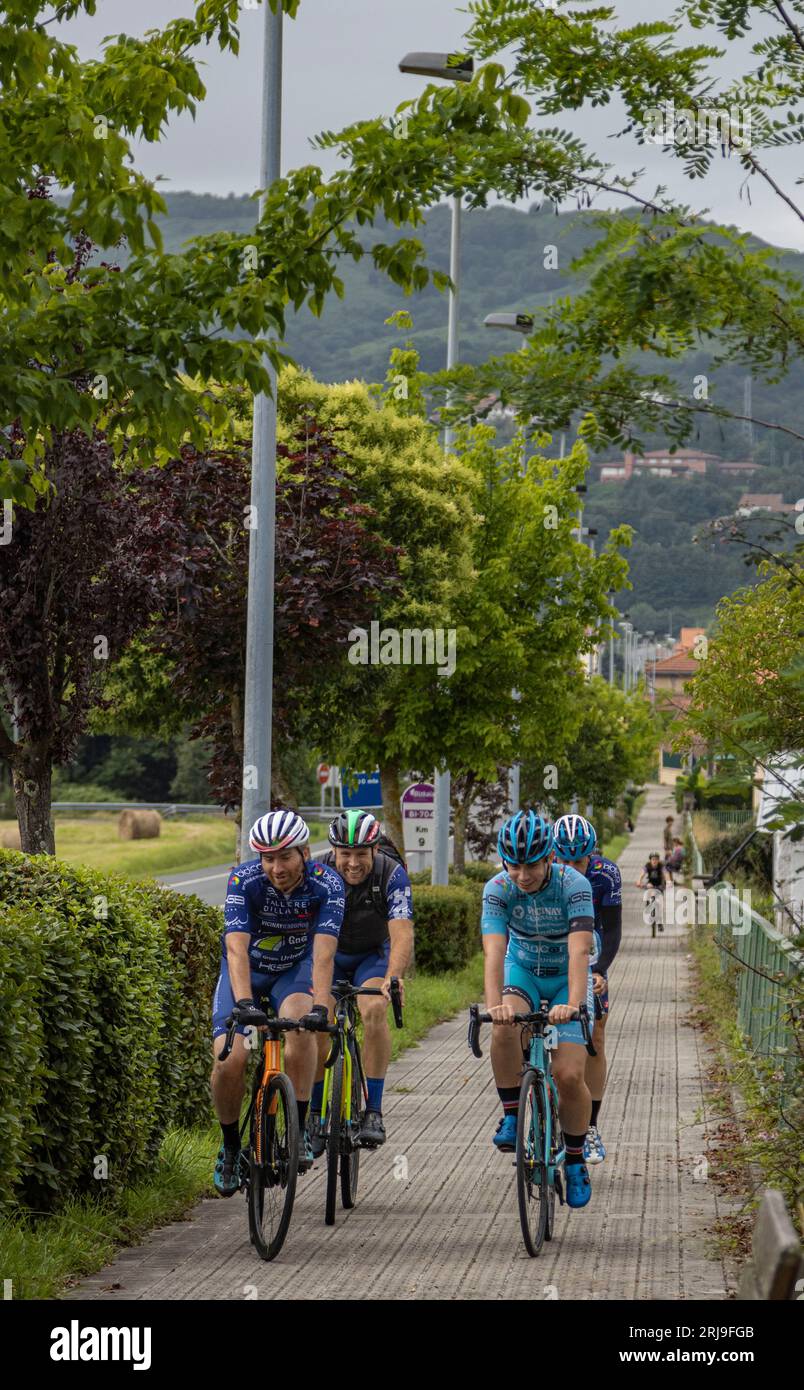 The first day of France tour, Cyclists run near a Bilbao village, Loiu Stock Photo