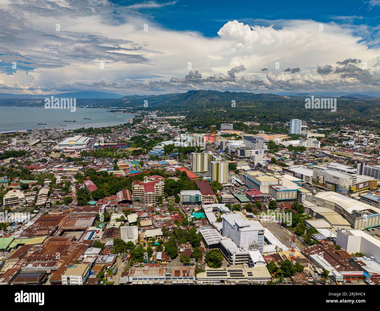 Beautiful city and blue sky and clouds in Cagayan de Oro. Northern Mindanao, Philippines. Cityscape. Stock Photo