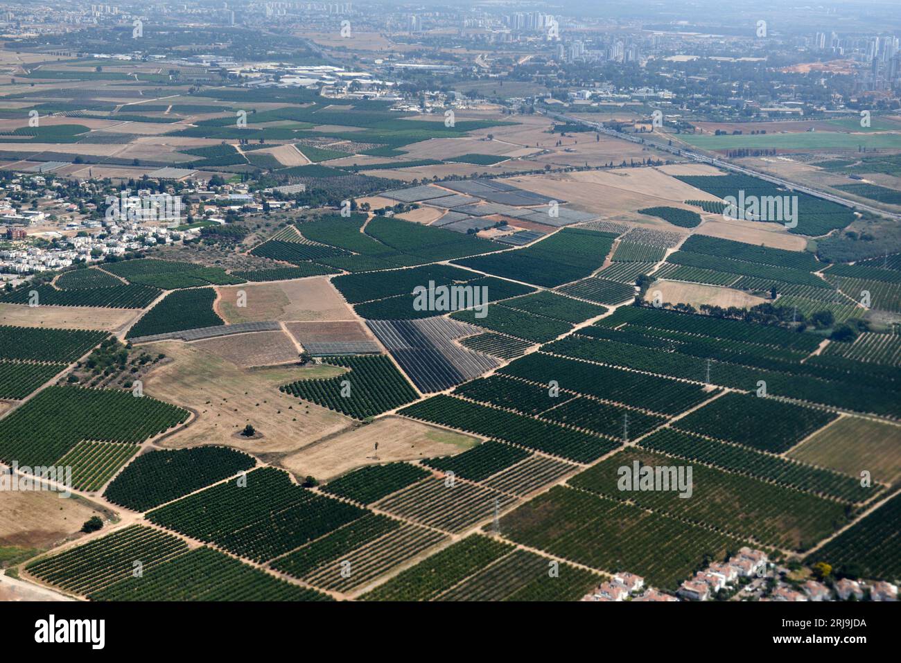 Aerial view of agriculture land and the highways in the Shfela region ...