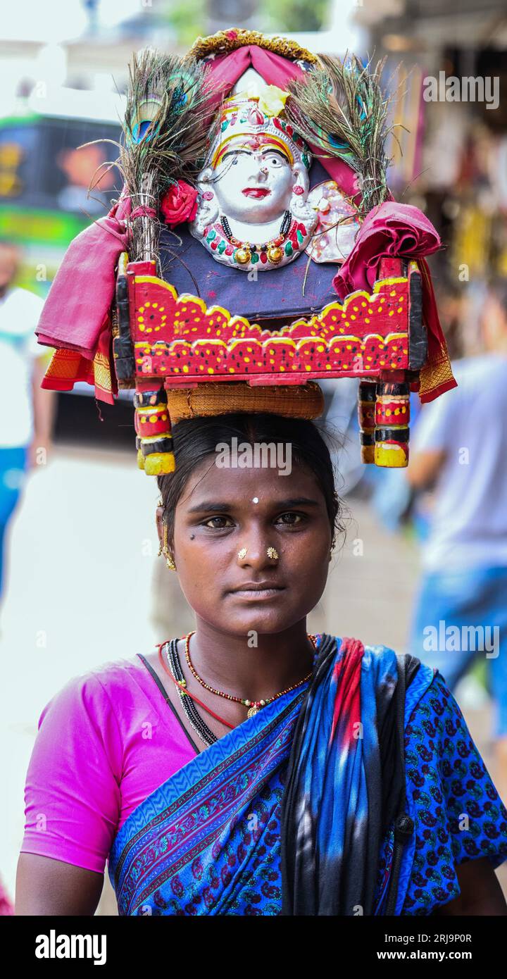 Margao, South Goa, India. 22nd Aug, 2023. Collecting money for Shiva in the Narrow passage ways selling anything imaginable in the busy and colourful market at the city of Margao, South India.Paul Quezada-Neiman/Alamy Live News Credit: Paul Quezada-Neiman/Alamy Live News Stock Photo
