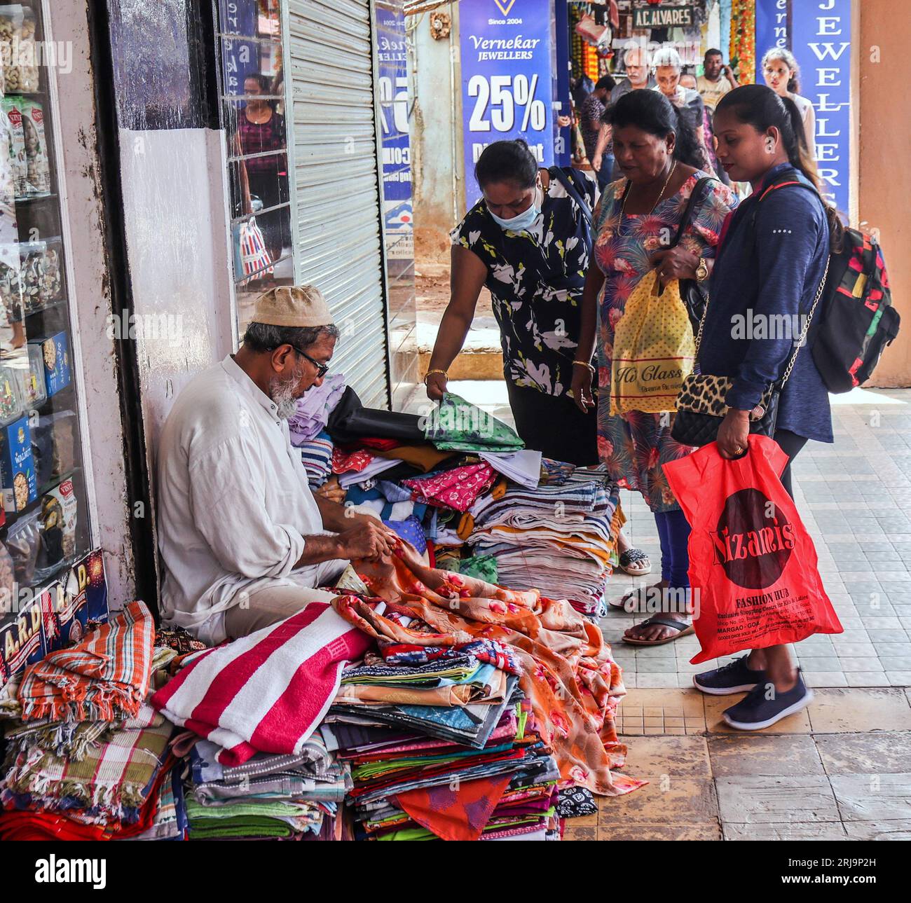 Margao, South Goa, India. 22nd Aug, 2023. Narrow passage ways selling anything imaginable in the busy and colourful market at the city of Margao, South India.Paul Quezada-Neiman/Alamy Live News Credit: Paul Quezada-Neiman/Alamy Live News Stock Photo
