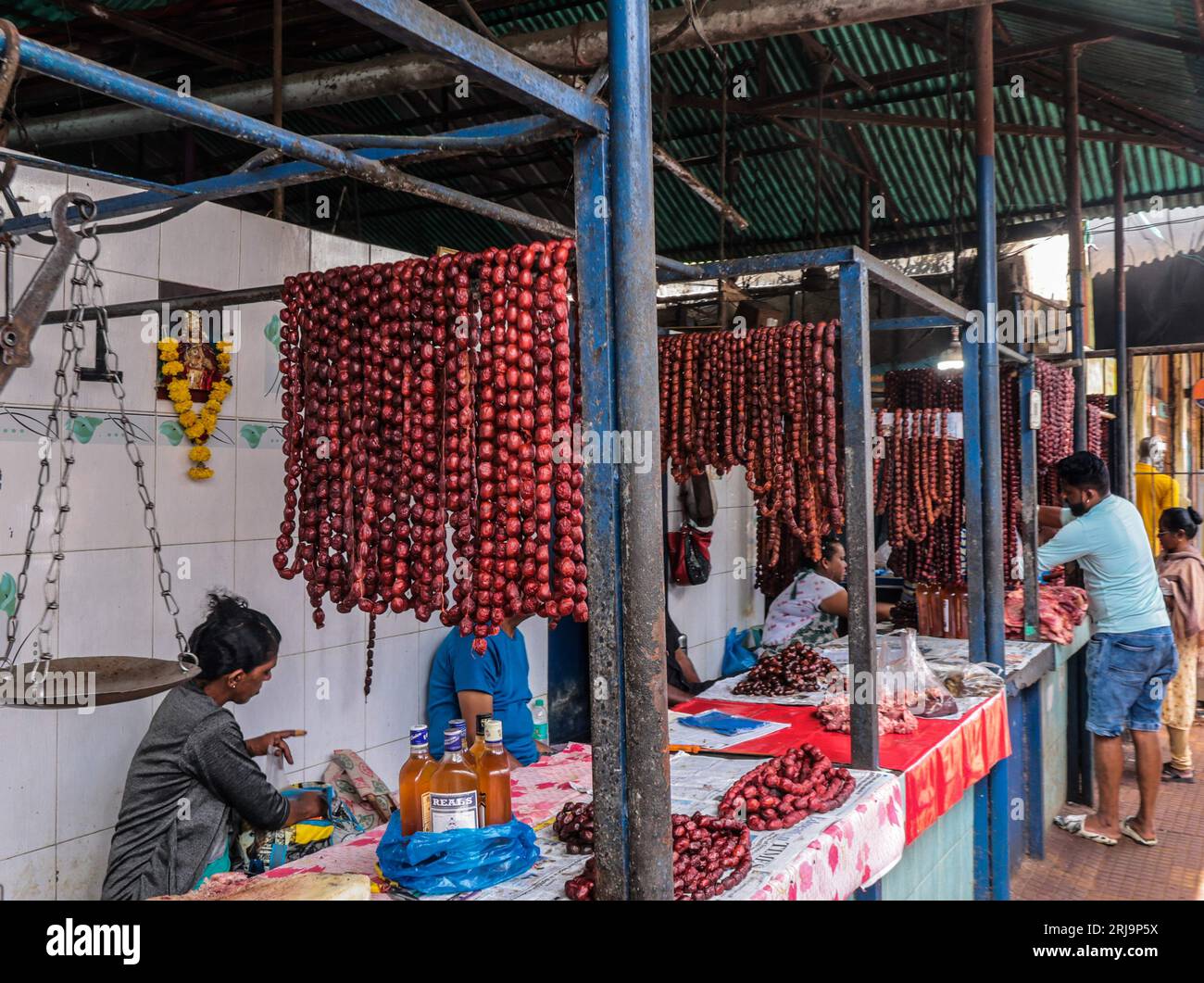 Margao, South Goa, India. 22nd Aug, 2023. pork sausages for sale in the Narrow passage ways selling anything imaginable in the busy and colourful market at the city of Margao, South India.Paul Quezada-Neiman/Alamy Live News Credit: Paul Quezada-Neiman/Alamy Live News Stock Photo