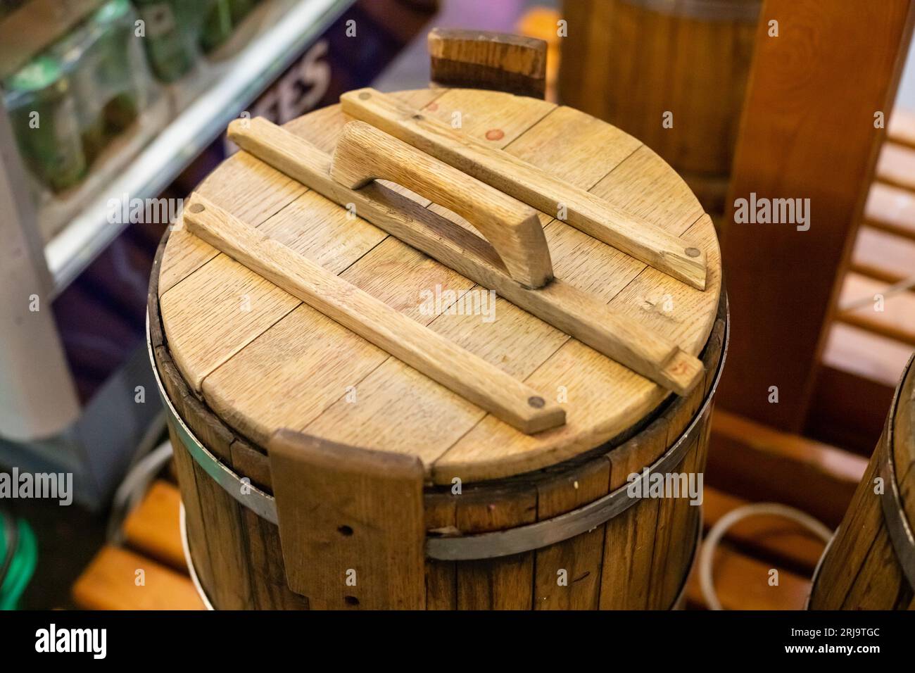 wooden barrel with lid. closed barrel for pickles. top view Stock Photo