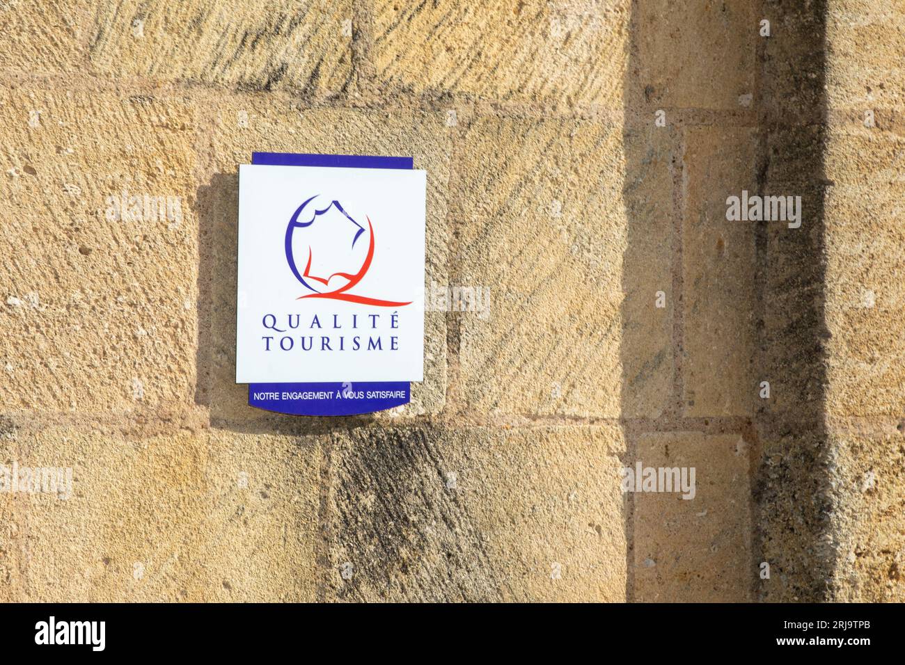 saint-emilion , France -  08 19 2023 : Qualite Tourisme logo brand and text sign on wall facade state france guaranteed of French hospitality and qual Stock Photo