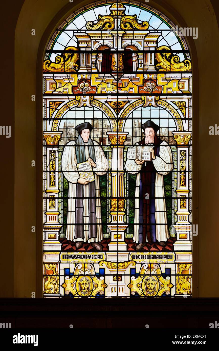 Stained glass window of Thomas Cranmer and John Fisher in the chapel at Emmanuel College, University of Cambridge, England. Stock Photo