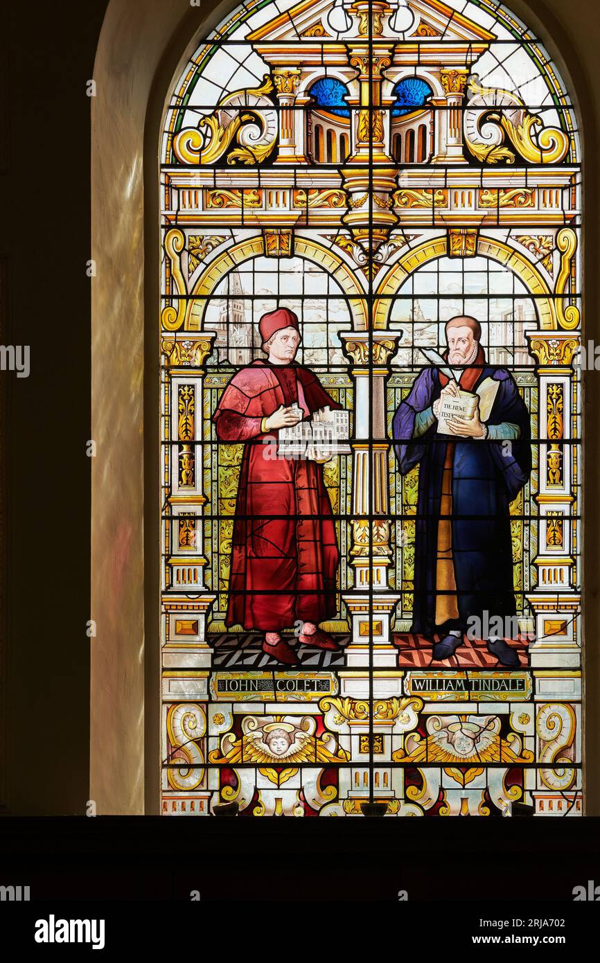 Stained glass window of John Colet and William Tyndale in the chapel at Emmanuel College, University of Cambridge, England. Stock Photo