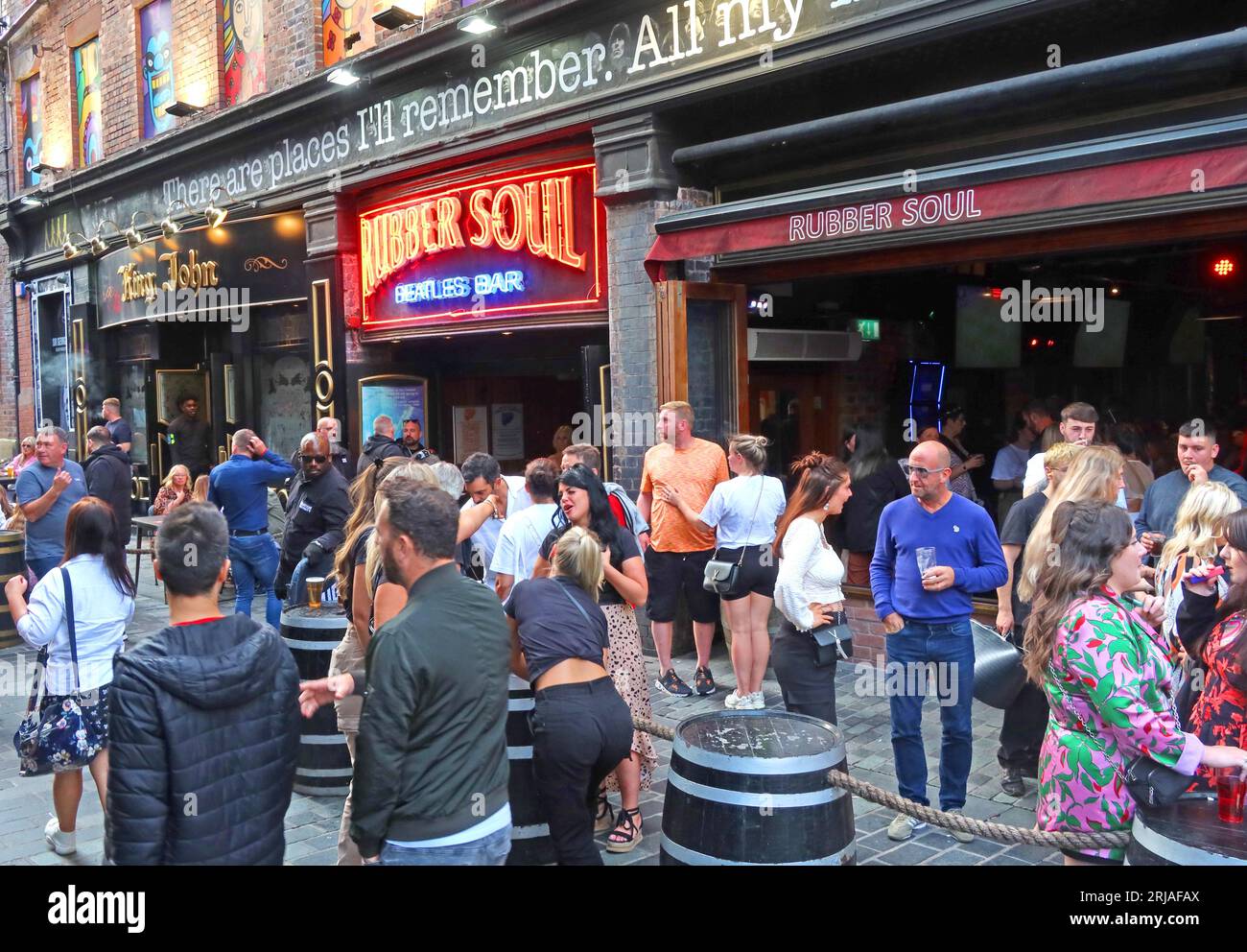 Crowds enjoying Rubber Soul Beatles bar, Mathew Street, Cavern Quarter, Liverpool, Merseyside, England, UK, L2 6RE Stock Photo