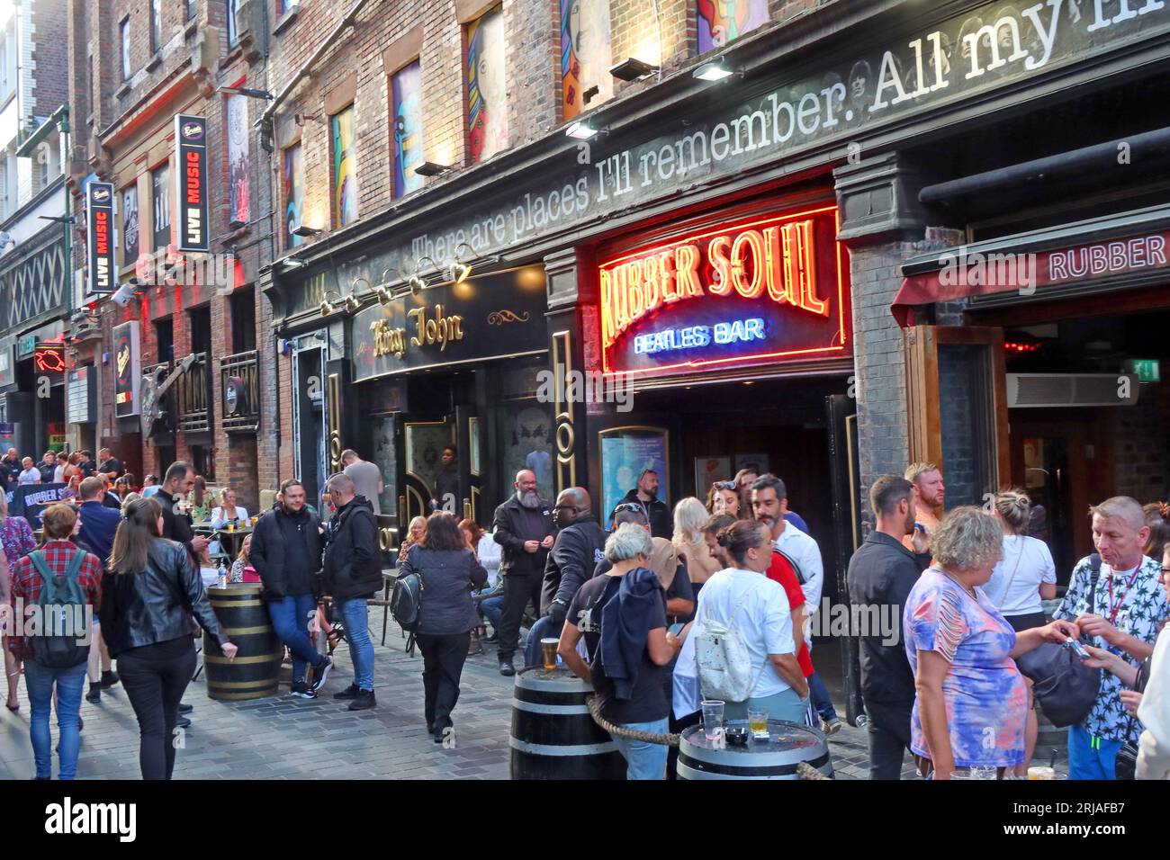 Crowds enjoying Rubber Soul bar, Mathew Street, Cavern Quarter, Liverpool, Merseyside, England, UK, L2 6RE Stock Photo