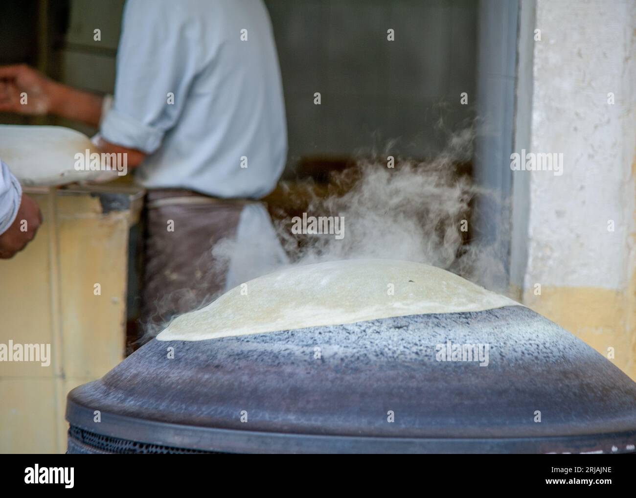 December 15 2021Baker kneading hull to make bread in jordan Stock