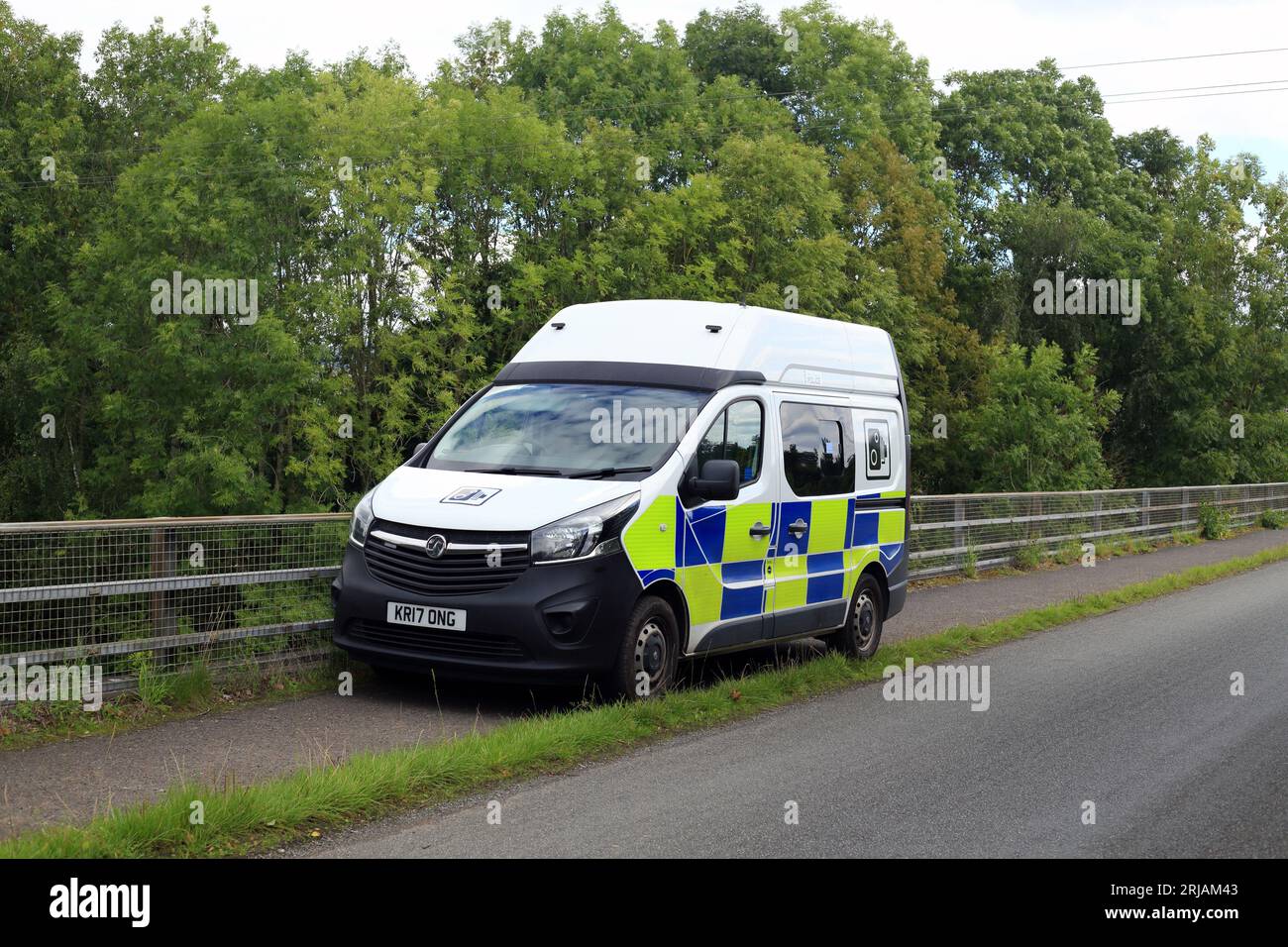 Police speed camera van parked on a bridge over a dual carriageway in the UK. Stock Photo