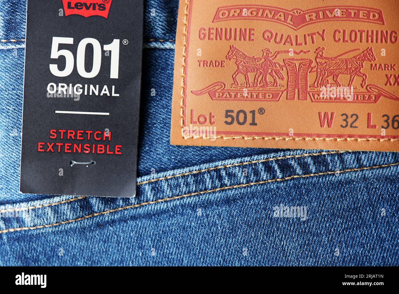 Levi's logo and badges on Levi Strauss 501 jeans. New dark blue LEVI'S 501 Jeans. Popular piece of clothing, classic jeans. Comfortable and practical Stock Photo