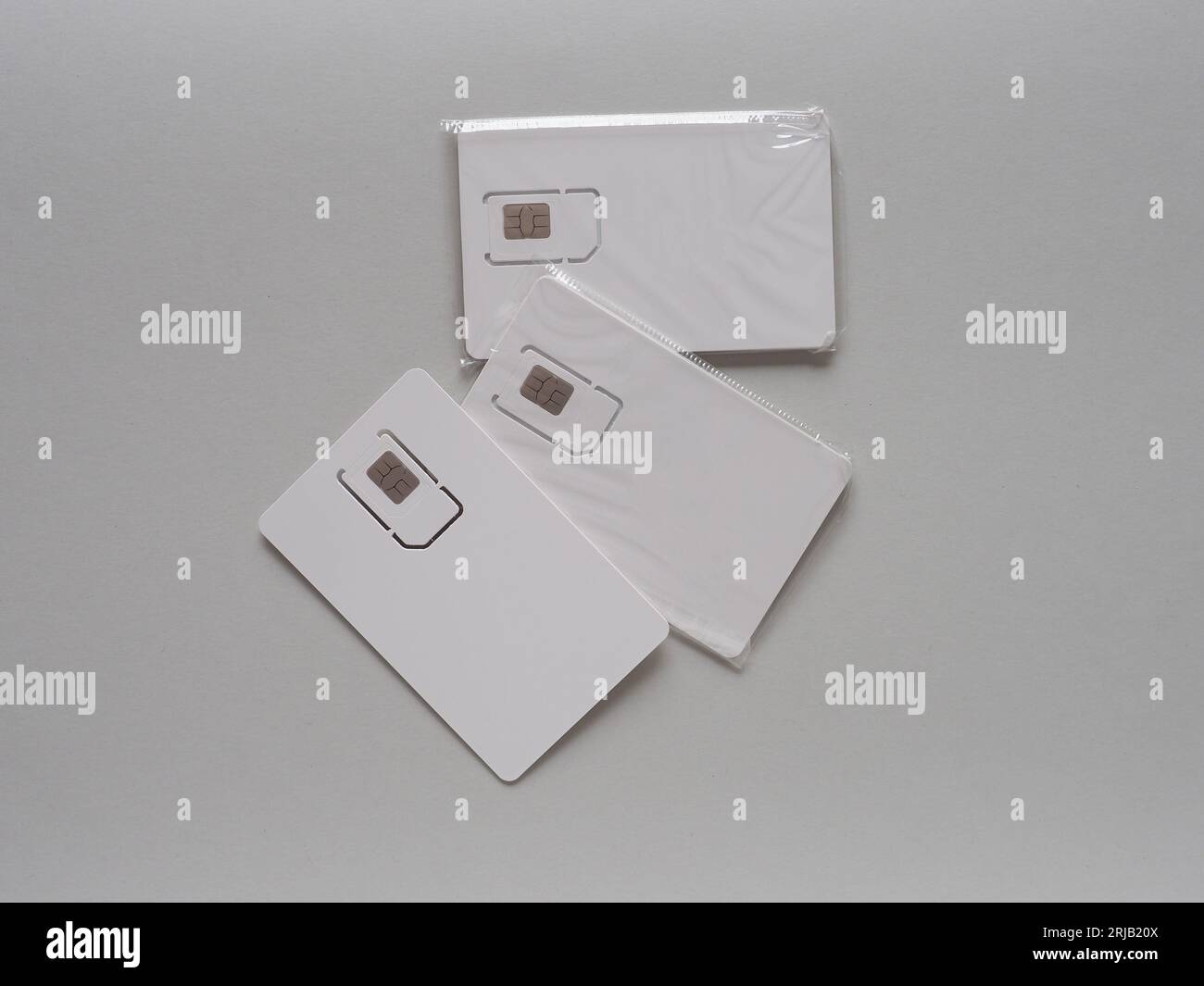 blank triple cut mini micro nano sim card with copy space Stock Photo
