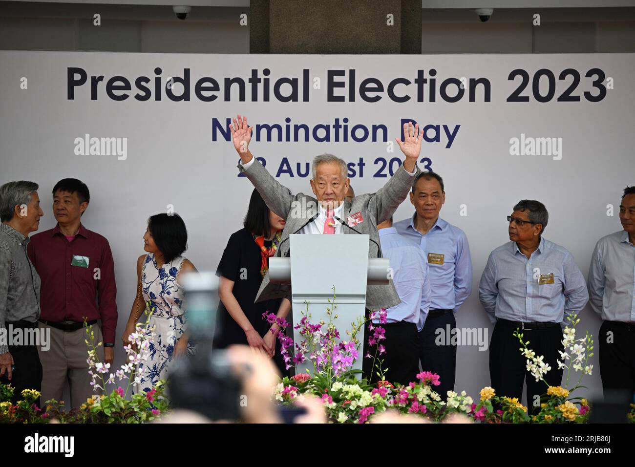 Singapore. 22nd Aug, 2023. Presidential candidate Ng Kok Song waves to his supporters at the nomination centre for the upcoming presidential election in Singapore on Aug. 22, 2023. Singapore will hold polls for the presidential election on Sept. 1, Returning Officer Tan Meng Dui announced on Tuesday after three candidates filed nomination documents. Credit: Then Chih Wey/Xinhua/Alamy Live News Stock Photo