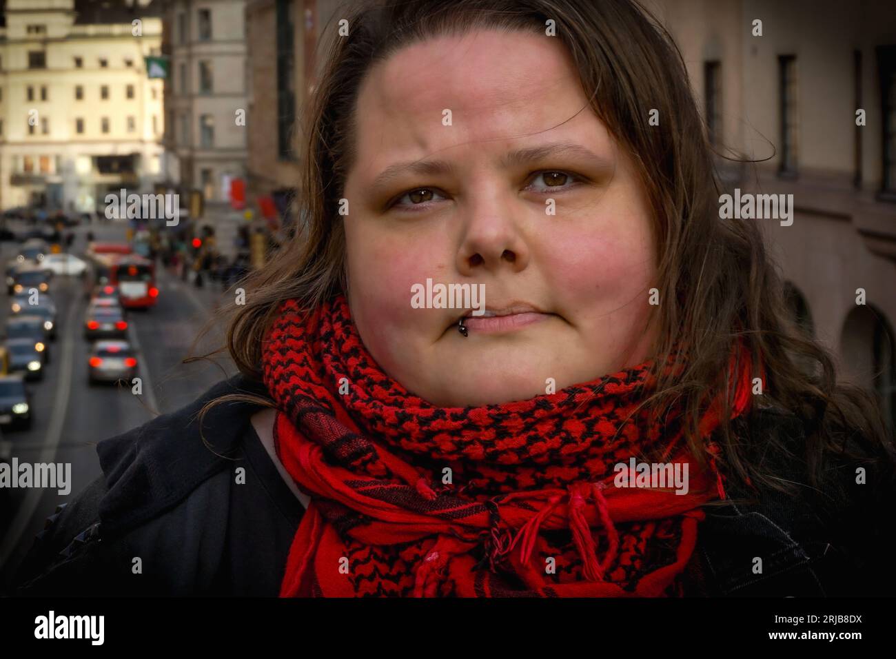 Woman standing sad street hi-res stock photography and images - Alamy