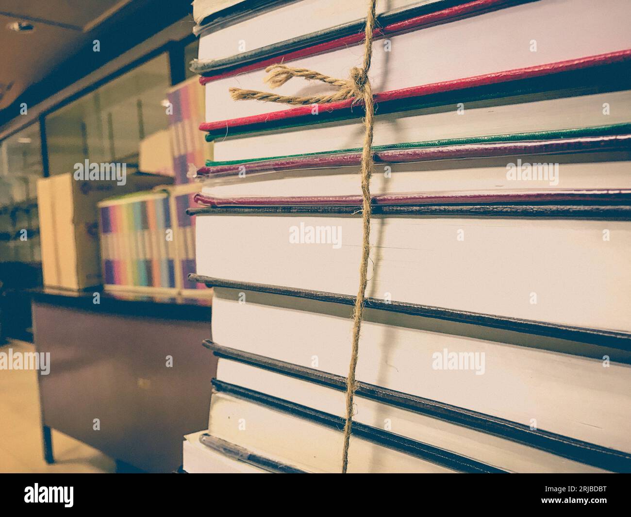 Wallpaper Ropes Book Pile of old books with rope background Stock Photo - Alamy