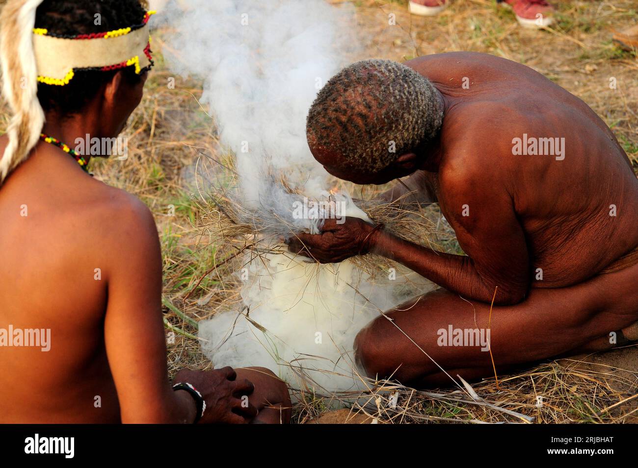Bushman making fire hi-res stock photography and images - Alamy
