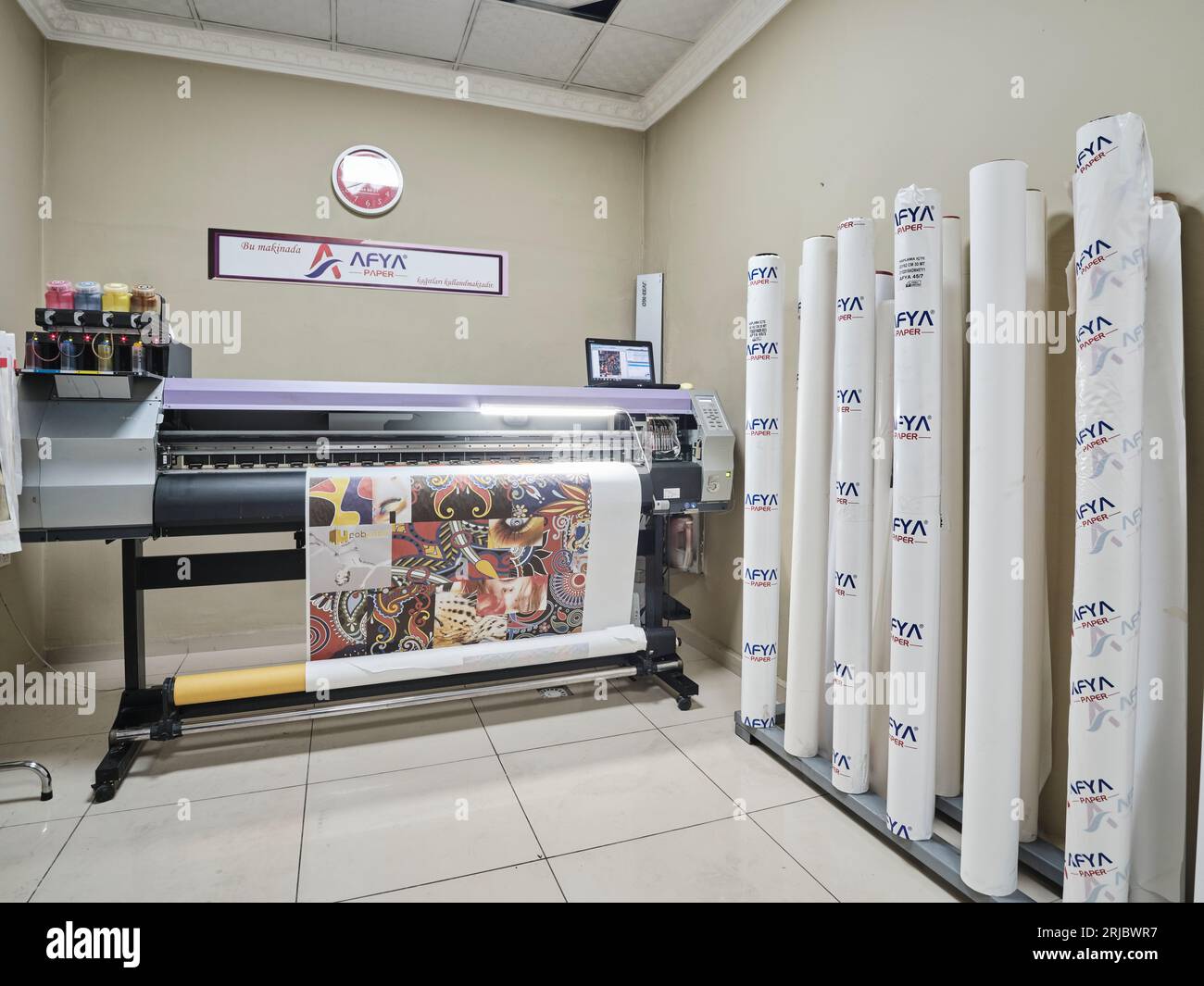 big paper rolls in a factory. Brown paper rolls used for packaging in