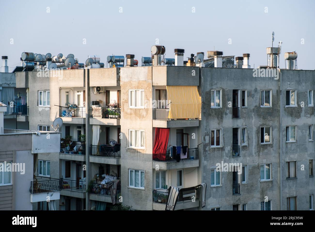 Water tanks on the roof of a residential building in Antalya Stock