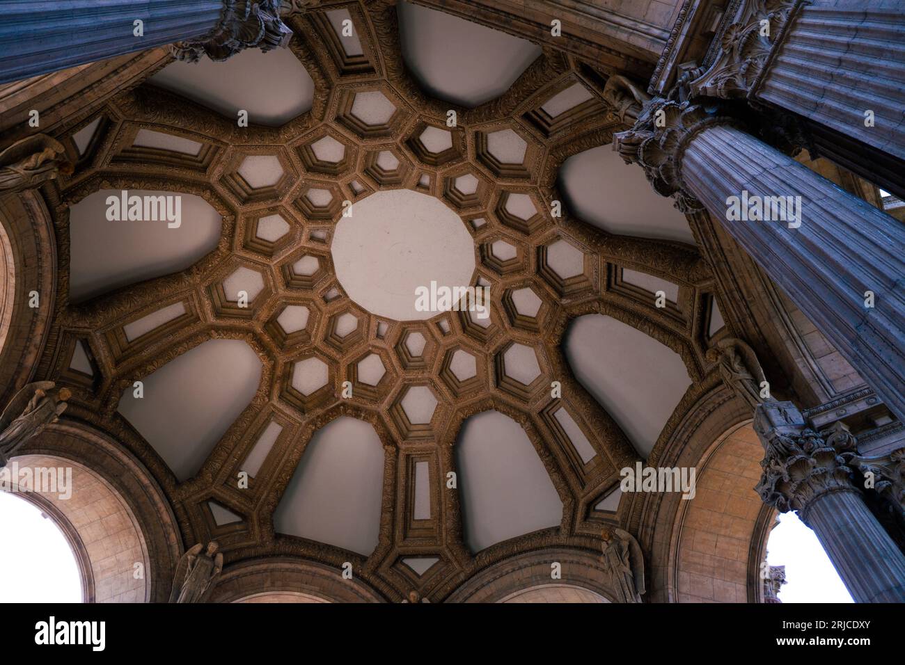 A distinctive architectural structure with ornate columns and intricate ceiling designs Stock Photo