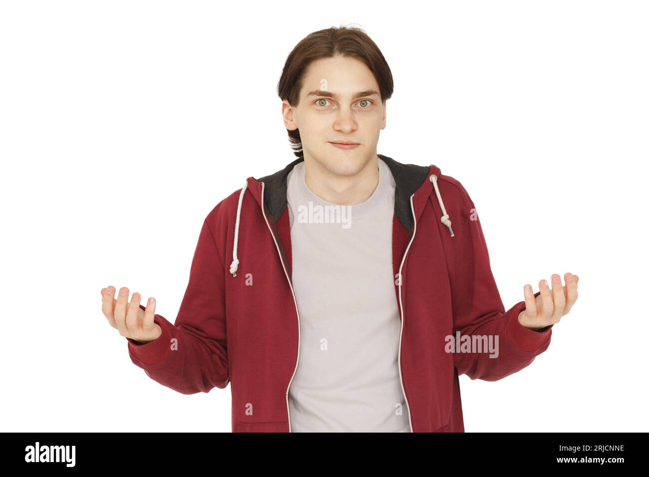 Surprised man in red hoody on white background Stock Photo