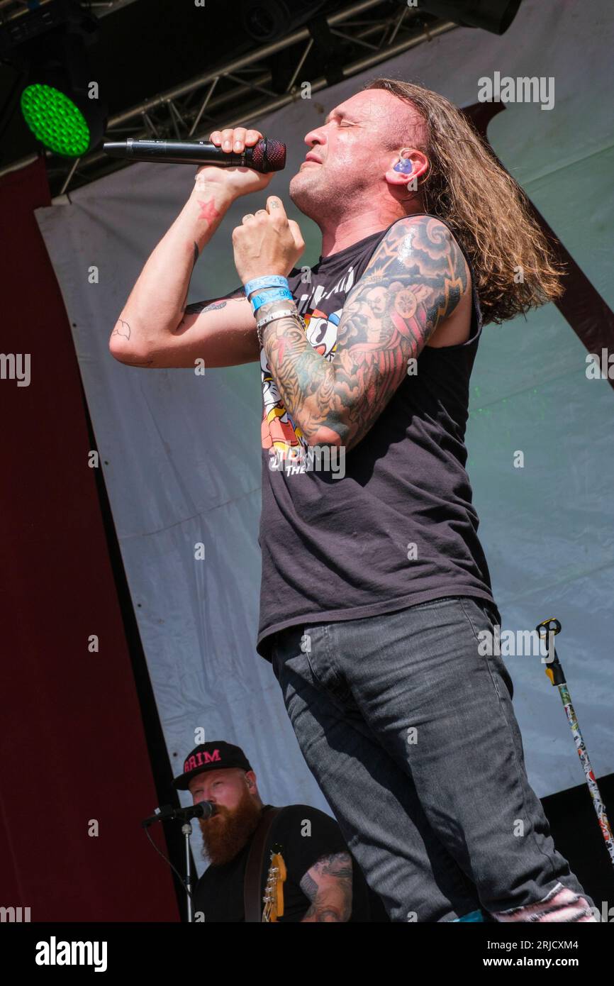 Barry 'Baz' Mills of Massive Wagons performing at the Weyfest Music Festival, August 20, 2023 Stock Photo
