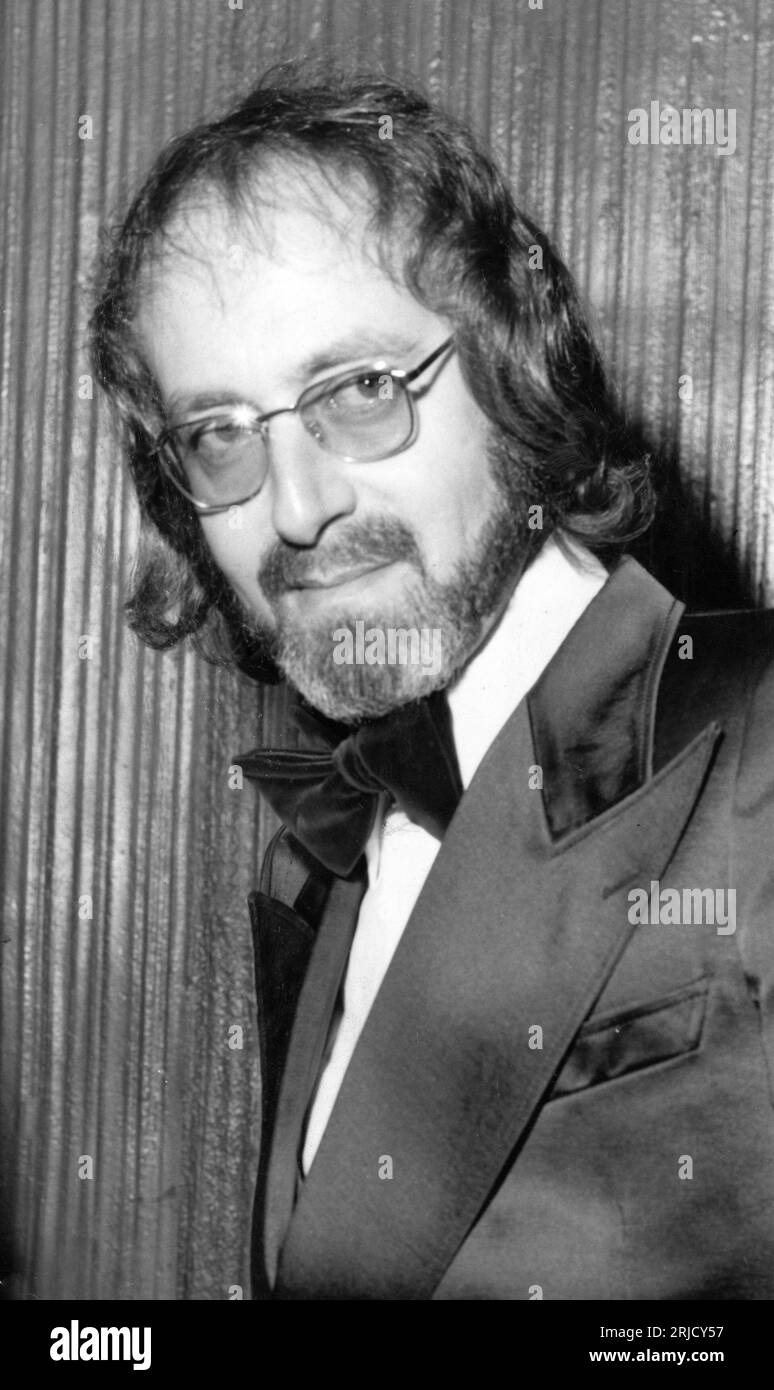 Film Composer JOHN BARRY at unidentified London film premiere in early 1972 from P.I.C. Photos 280 Uxbridge Road, London W12 Stock Photo