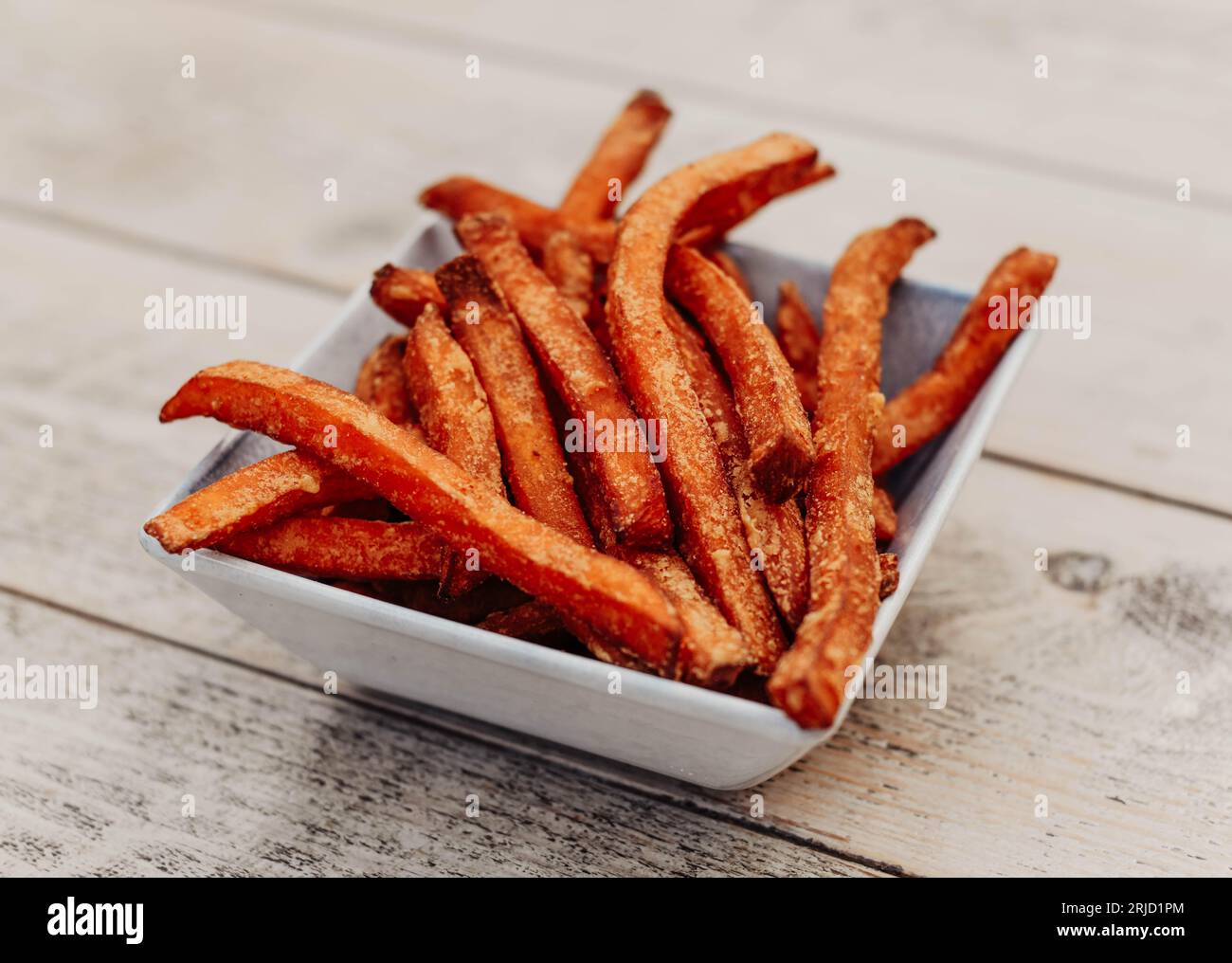 Serving of fried sweet potatoes French fries style Stock Photo Alamy