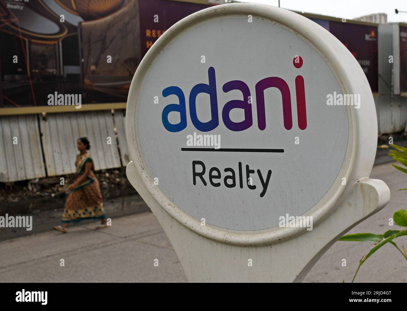 Adani Group considers raising $10 billion debt in lower-cost debt, green  bonds | Mint