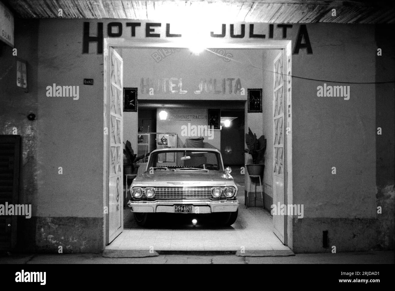 Mexico City Crime prevention 1970s. Hotel car parking, a car parked inside a hotel for safe keeping security at night. Mexico January 1973. HOMER SYKES Stock Photo