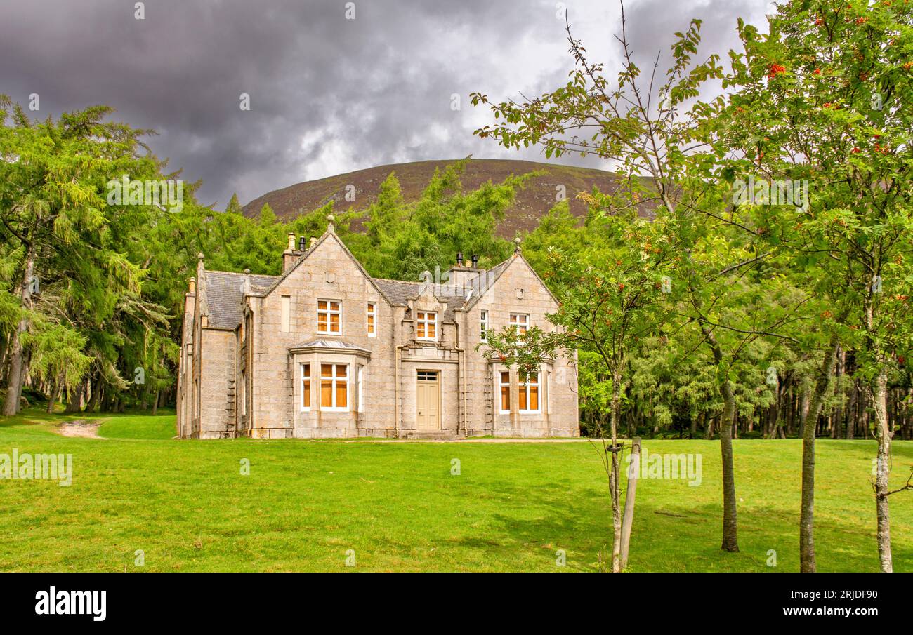 Loch Muick Ballater Balmoral Estate Scotland frontal view of Glas allt Shiel house in summer with red berries on the rowan trees Stock Photo