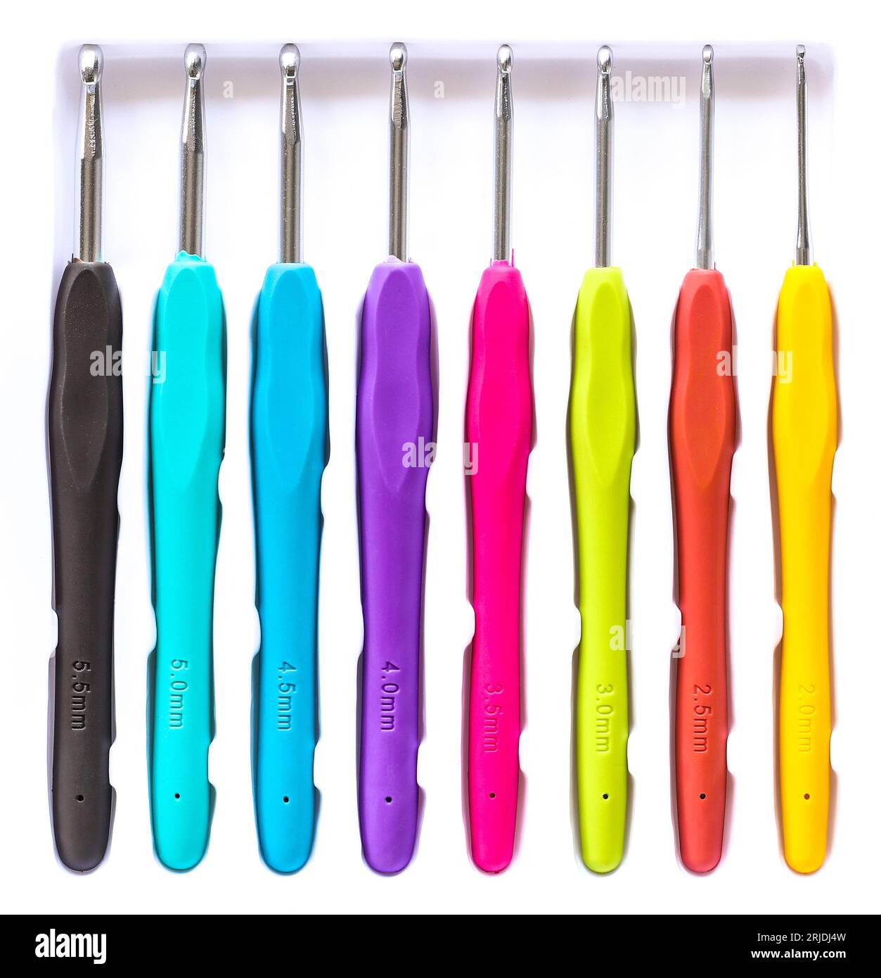 Crochet hooks set in different sizes with multicoloured handles Stock Photo