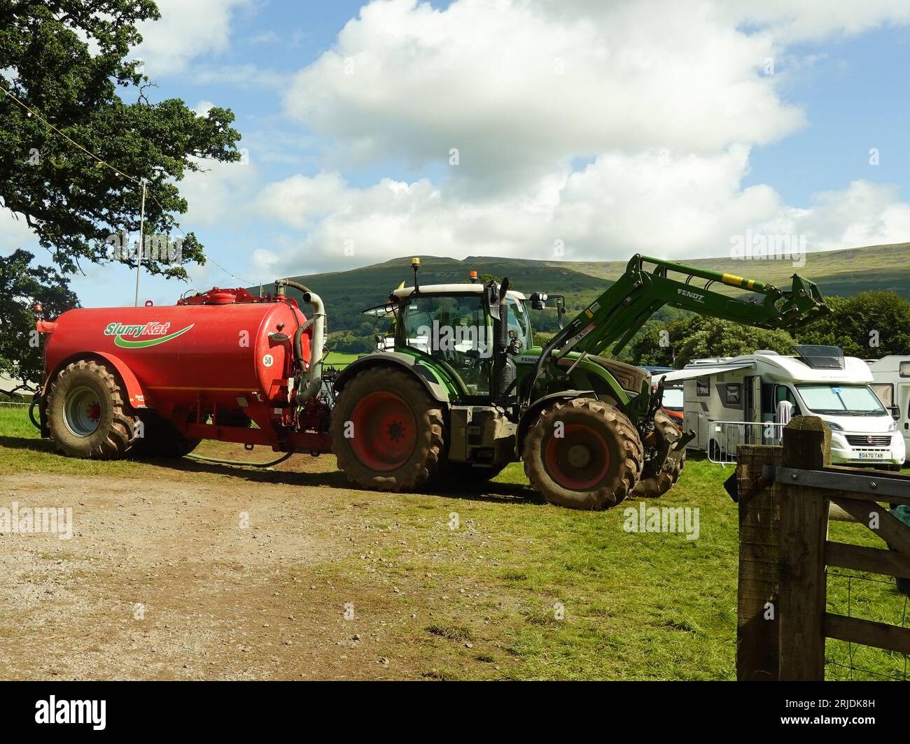 Tractor towing a slurry tanker Stock Photo