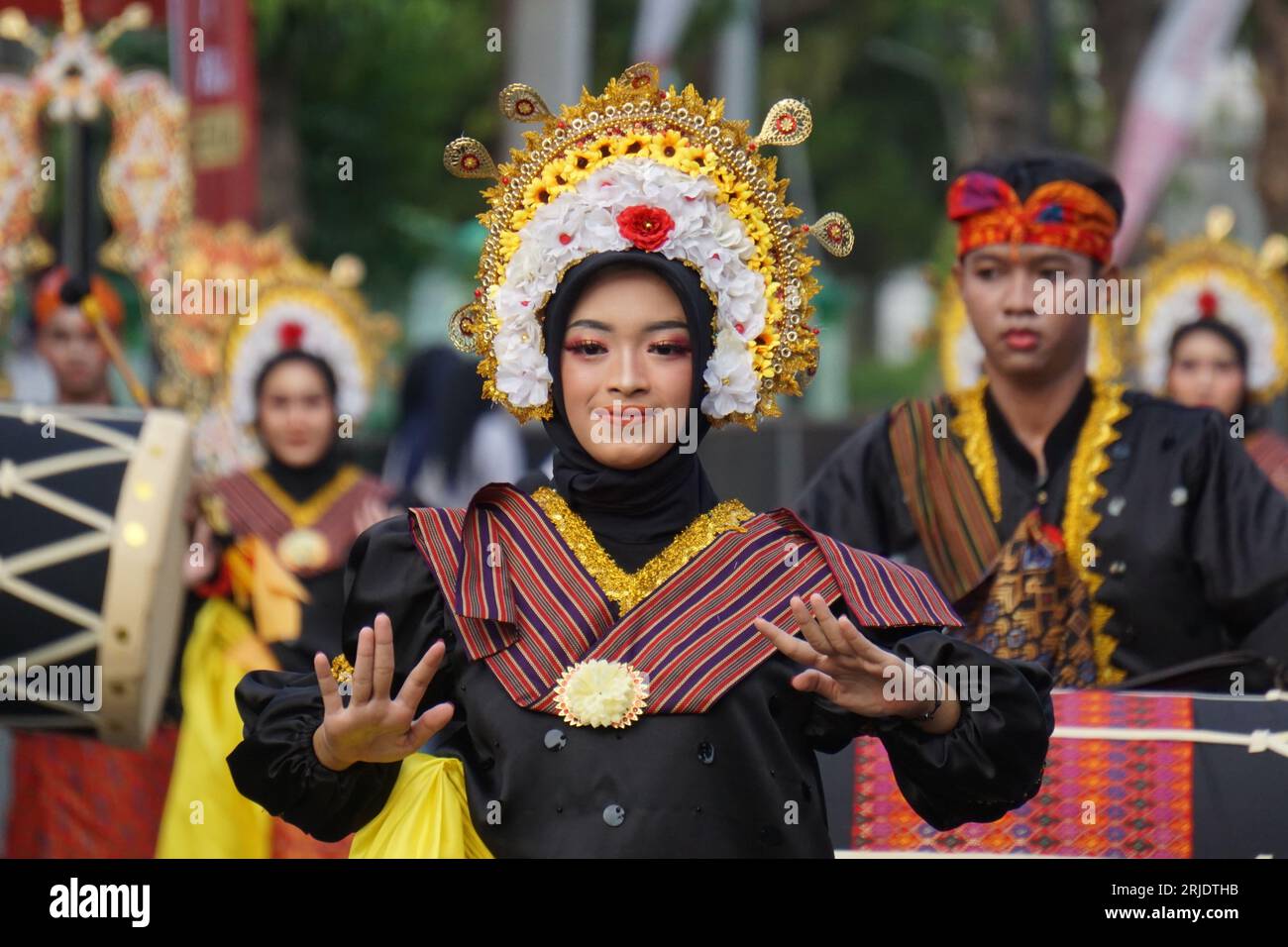 Dinde belek (Gendang Beleq) dance from Nusa Tenggara Barat at BEN Carnival. This dance is performed in sacred ceremonies, as well as weddings Stock Photo