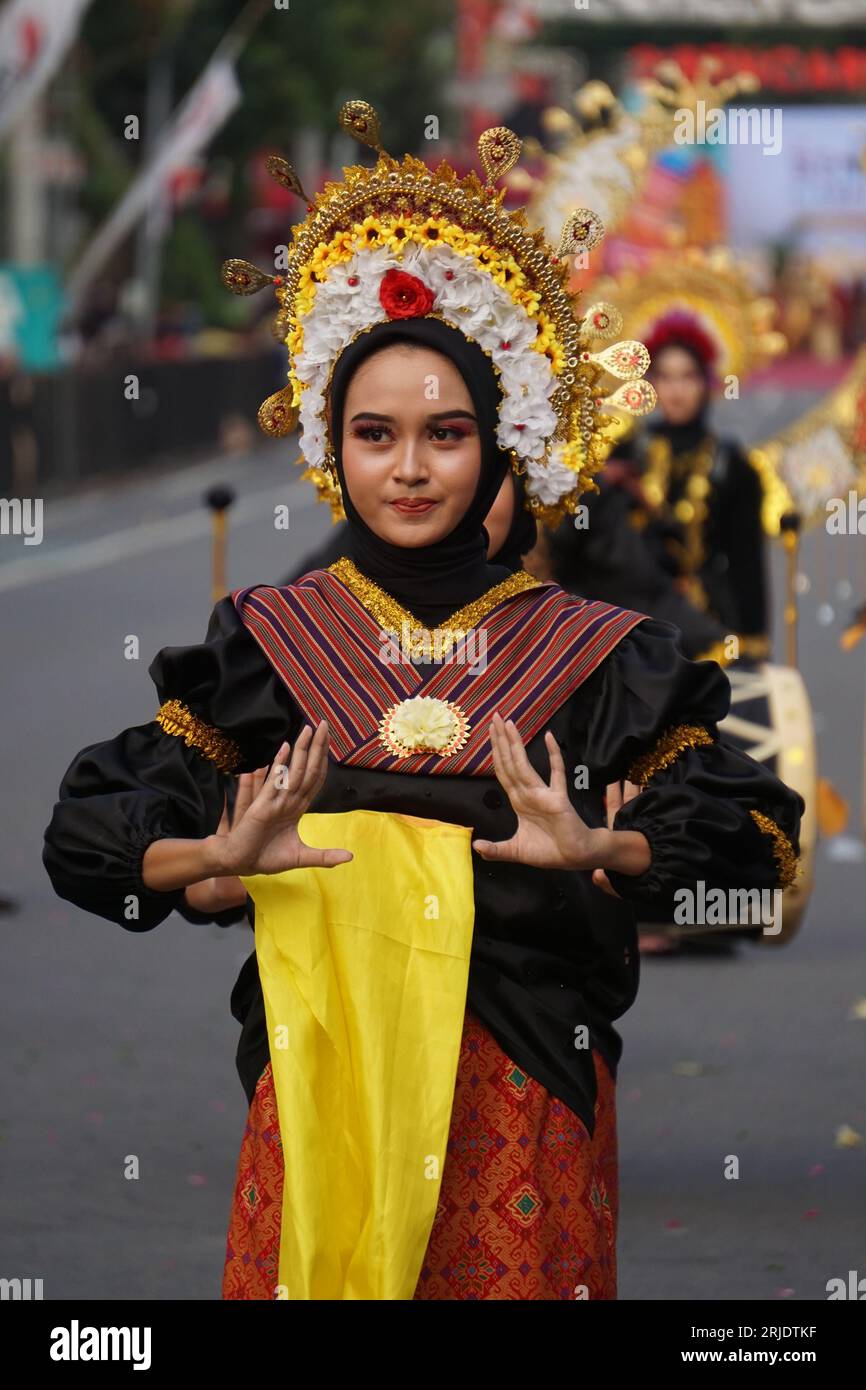 Dinde belek (Gendang Beleq) dance from Nusa Tenggara Barat at BEN Carnival. This dance is performed in sacred ceremonies, as well as weddings Stock Photo