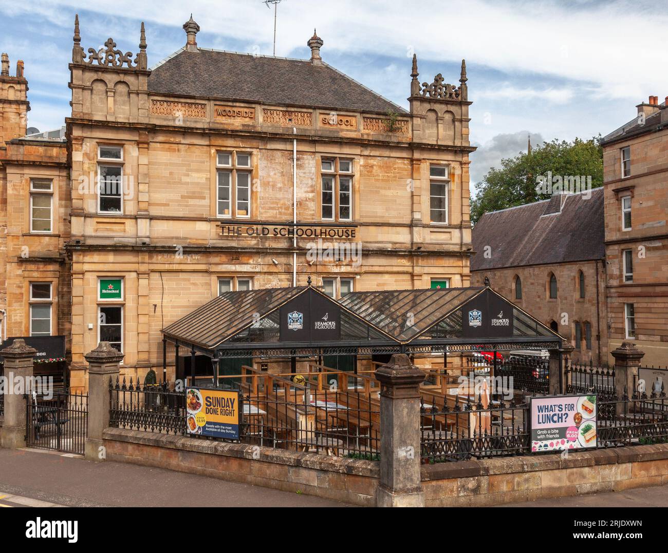 The Old Schoolhouse pub, formerly Woodside School (1882, Robert Dalgleish), then teachers' centre, in the West End of Glasgow, Scotland. Stock Photo