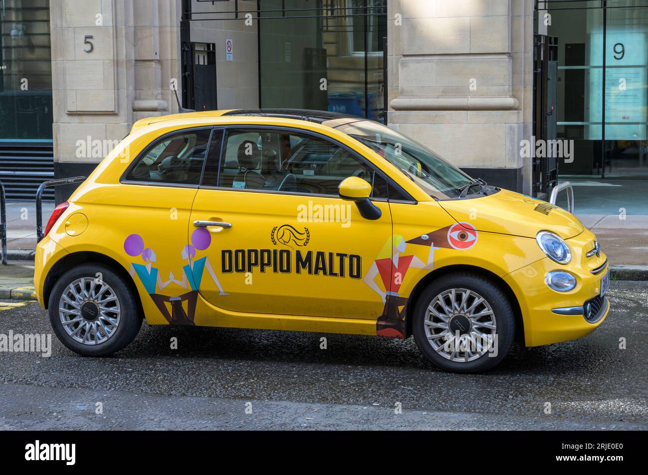 Doppio Malto Italian Restaurant branding advertised on a Fiat 500 car, Glasgow, Scotland, UK, Europe Stock Photo