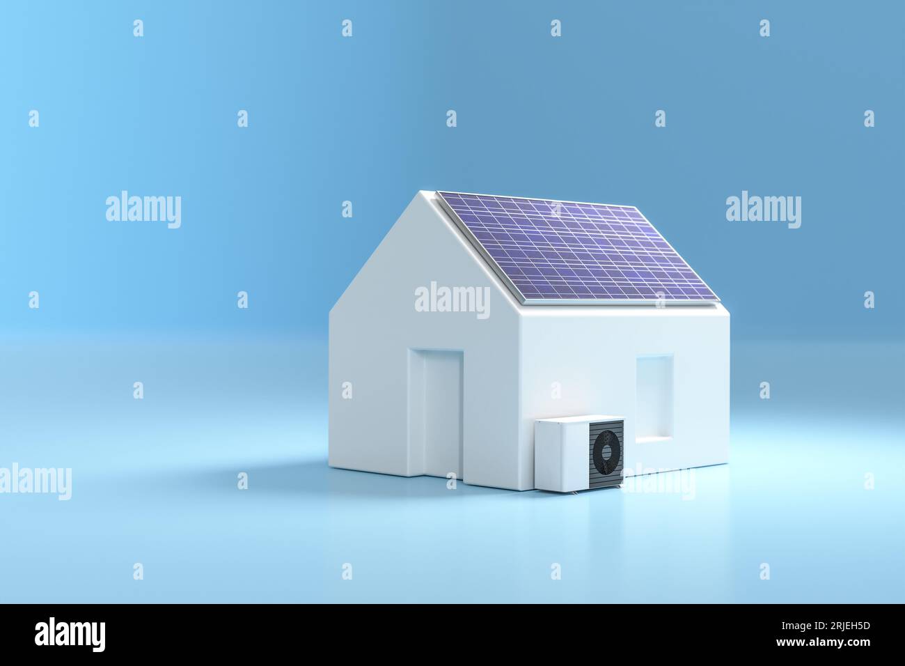 Model home with solar panel and heatpump. Concept for sustainable power generation and heating with electric heatpumps. Stock Photo