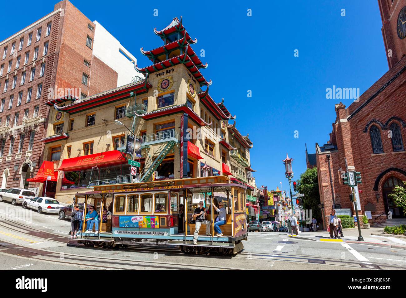 Cable Car driving up the hill in Chinatown, San Francisco California